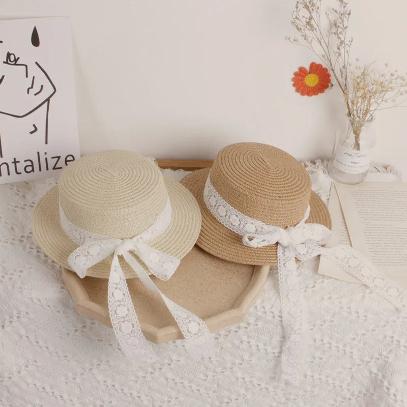 Big along the bowknot children's straw hat hot models baby girl beach hat handmade hollow lace sun hat